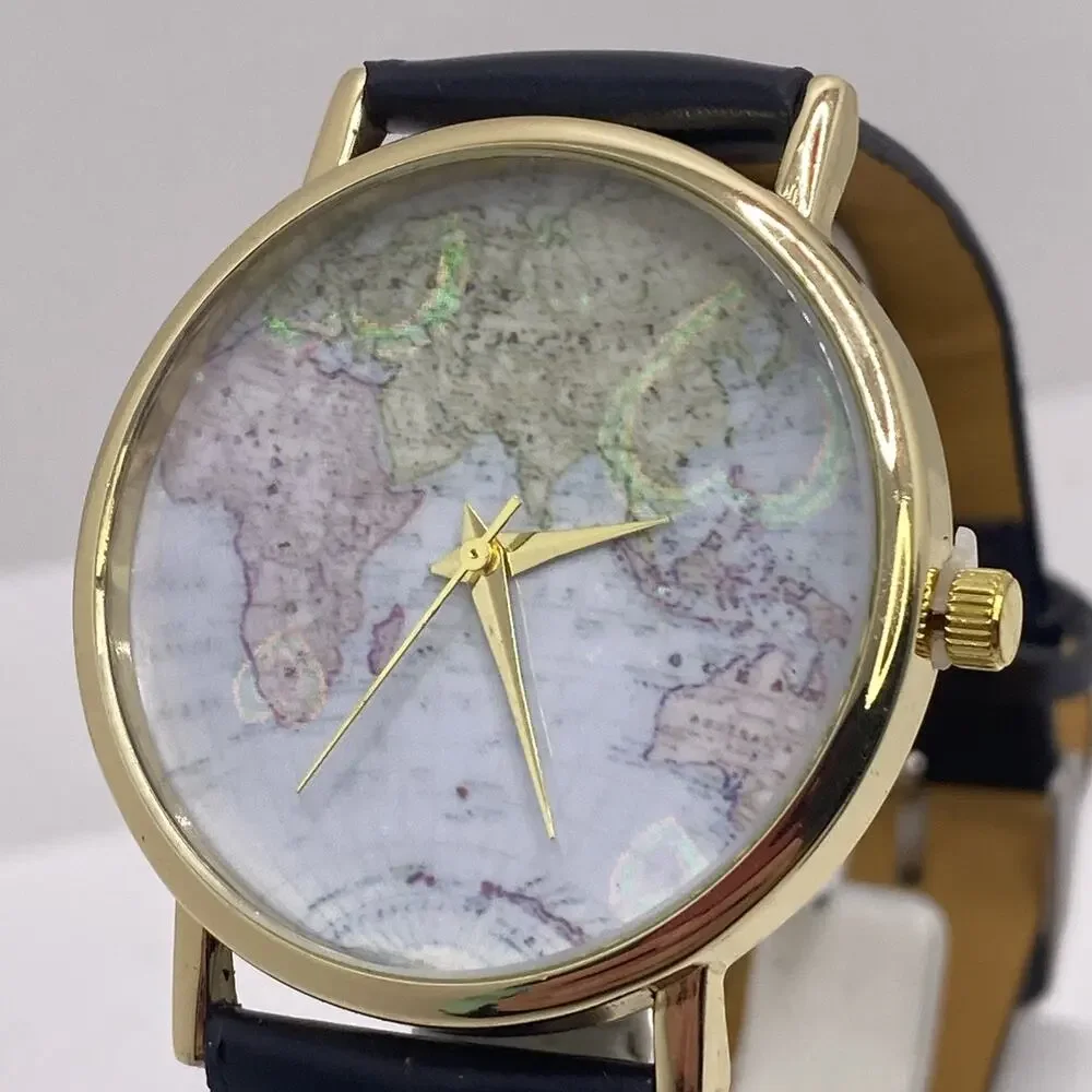 Womens Gold Tone World Map Watch New Battery